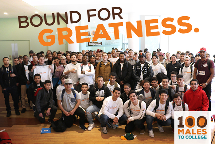 Framingham cohort of 100 Males to College poses under the words 'Bound for Greatness'