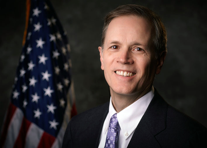 Headshot of Secretary Jim Peyser