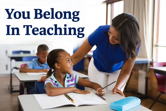 teacher working with an african american student one on one