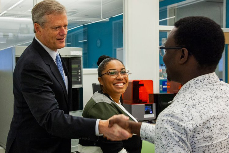 Governor Charlie Baker meets with QCC students Shantel Rutherford and Oliver Dogma.
 