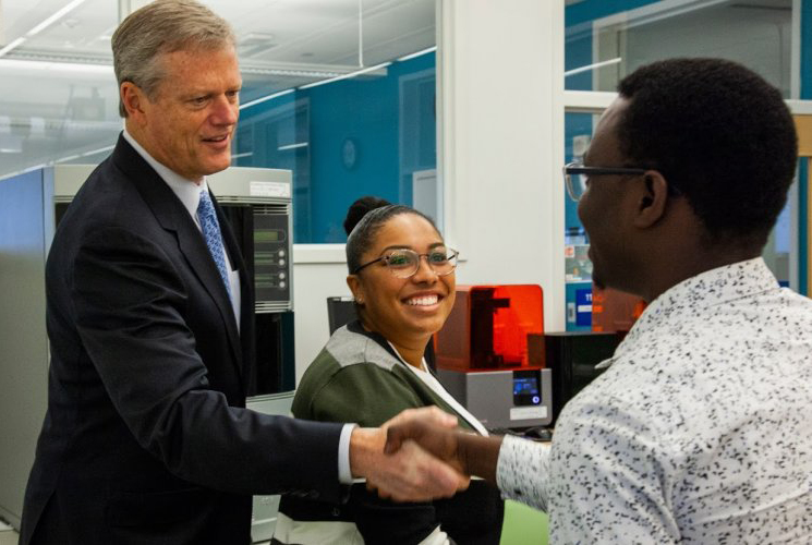 Governor Charlie Baker meets with QCC students Shantel Rutherford and Oliver Dogma.
 