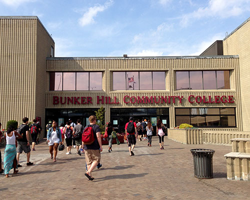 students walk into the front doors of bunker hill community college